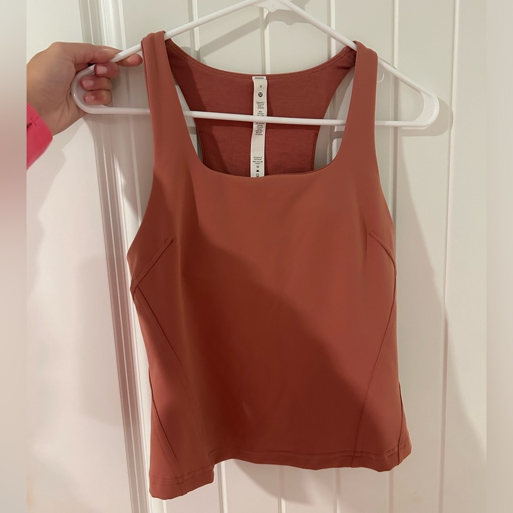 LULULEMON Tank top size 6 in a dusty rose color. Has built in padding.